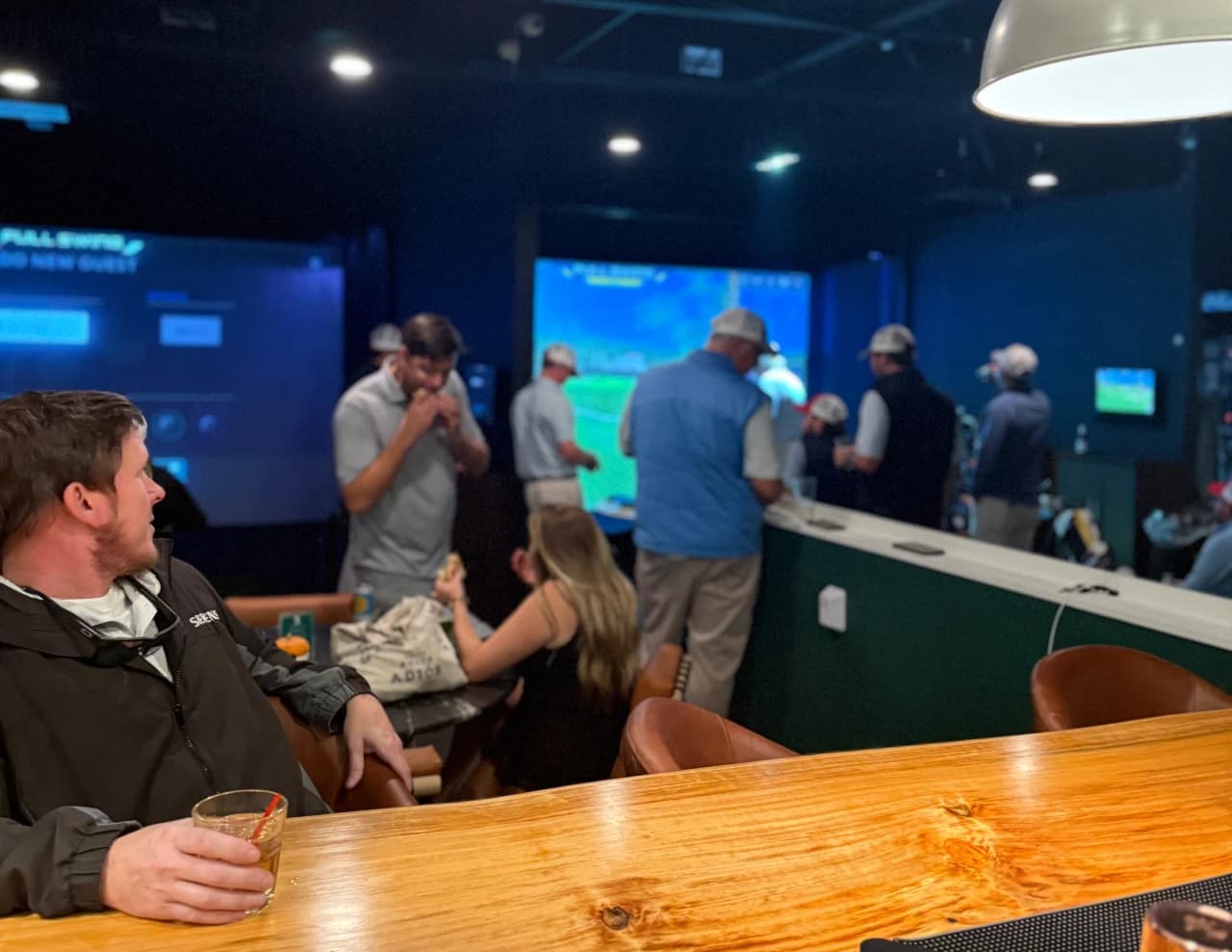 Swing Away Golf — private bays with 4K screens and Full Swing simulators